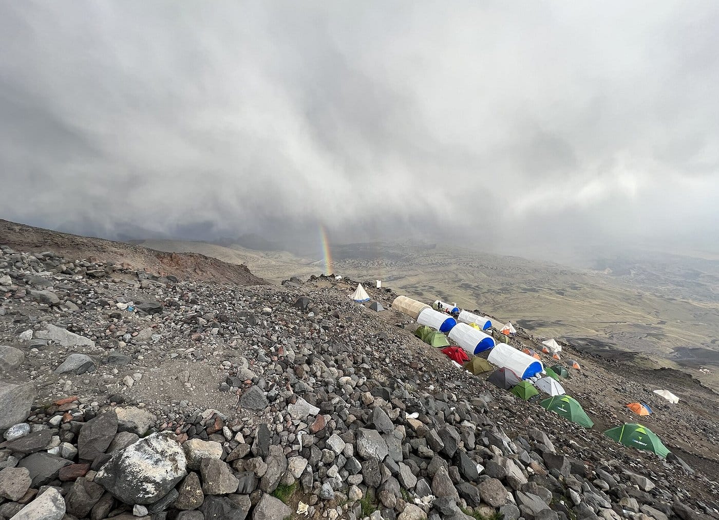 Mount Ararat expedition budget planning with gear, permits, and cost calculations laid out showing camp and equipment setup